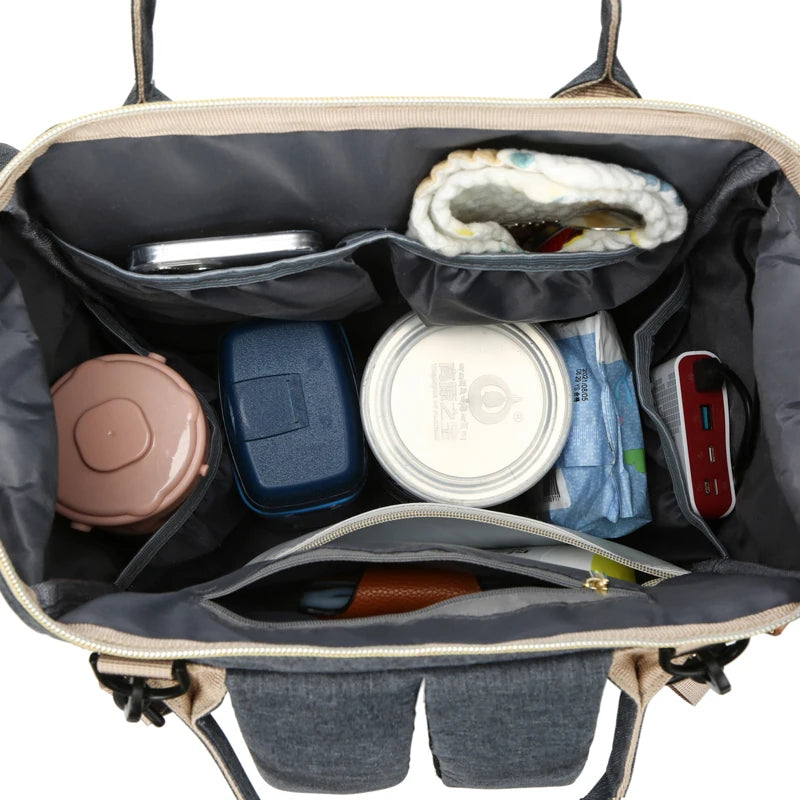 👩‍👧 Kit Mamá Moderna – Pañalera + Fular Cargador Gris + Set de Comida 👉 Elige aquí abajo el color de tu pañalera y de tu set de comida (el fular siempre es gris)